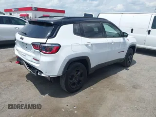 2023 Jeep Compass Trailhawk с VIN 3C4NJDDN5PT557872, выставлен на аукционе IAAI как лот 42152545 с пробегом 46 203 миль миль и . История ставок и продаж доступна на DreamBid. Изображение 4.