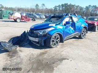 2018 Toyota C-HR XLE with VIN NMTKHMBX4JR042767, listed as a IAAI auction lot 41899299 with 1 mi miles. Bid and sale history available at carsss.com. Image 16.