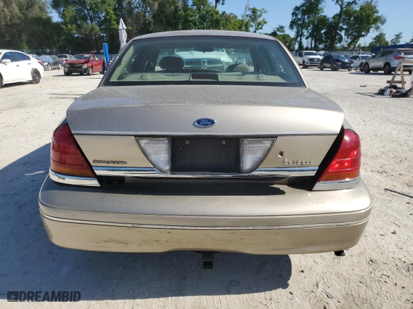 2000 Ford Crown Victoria with VIN 2FAFP73W4YX216080, listed as a Copart auction lot 53774835 with 144,404 mi miles and Salvage Title. Bid and sale history available at carsss.com. Image 6.