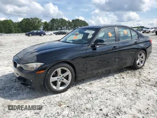 2013 BMW 3 Series 328i with VIN WBA3C1C50DK104593, listed as a Copart auction lot 60052665 with 90,872 mi miles and Salvage title. Bid and sale history available at DreamBid. Image 1.
