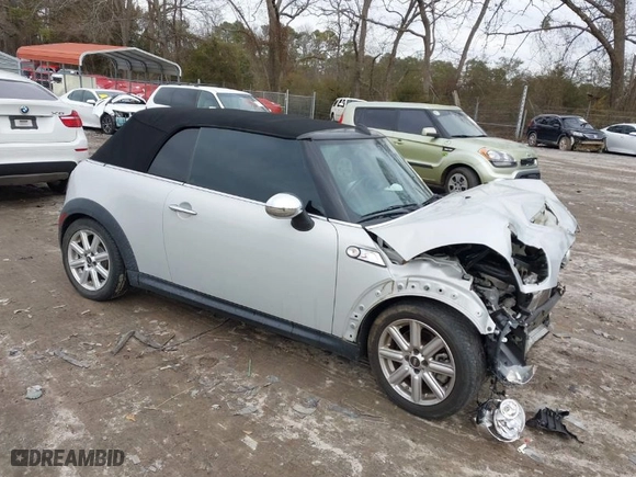 2011 MINI Cooper Convertible s with VIN WMWZP3C55BTX82922, listed as a IAAI auction lot 41408777 with 82,764 mi miles. Bid and sale history available at carsss.com. Image 1.
