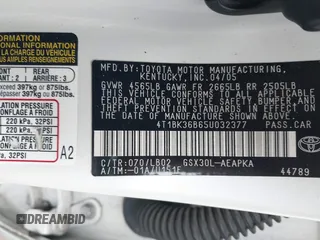 2005 Toyota Avalon XL z VIN 4T1BK36B65U032377, wystawiony jako IAAI lot #42100475 z przebiegiem Nie podano mil oraz . Historia ofert i sprzedaży dostępna na DreamBid. Obrazek 8.