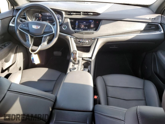 2021 Cadillac XT5 FWD Premium Luxury with VIN 1GYKNCRS5MZ138712, listed as a Copart auction lot 49697945 with 54,893 mi miles and Salvage Title. Bid and sale history available at carsss.com. Image 8.