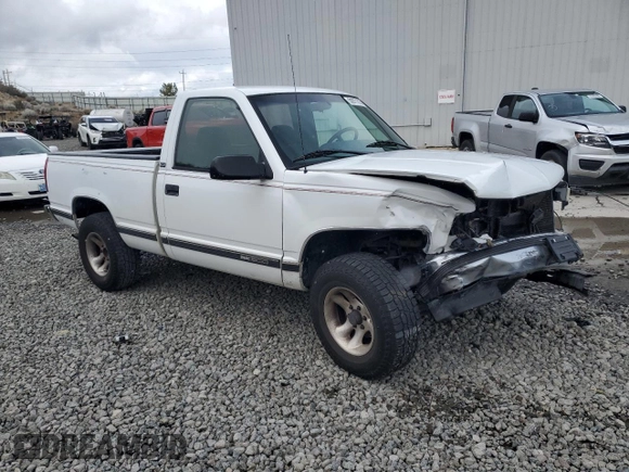 1995 GMC Sierra 1500 with VIN 1GTEK14K0SZ563517, listed as a Copart auction lot 50977315 with 280,549 mi miles and Salvage Title. Bid and sale history available at DreamBid. Image 4.