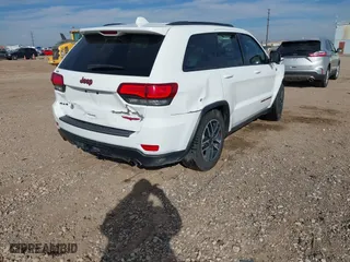 2019 Jeep Grand Cherokee Trailhawk with VIN 1C4RJFLG7KC726830, listed as a IAAI auction lot 41448850 with 97,218 mi miles. Bid and sale history available at carsss.com. Image 4.