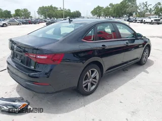 2023 Volkswagen Jetta SE with VIN 3VW7M7BU3PM037141, listed as a IAAI auction lot 42446046 with 21,149 mi miles and . Bid and sale history available at DreamBid. Image 4.