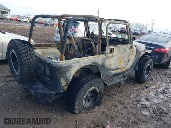 2003 Jeep Wrangler Sport with VIN 1J4FA49S93P374406, listed as a IAAI auction lot 41648982 with Not provided miles and . Bid and sale history available at DreamBid. Image 4.
