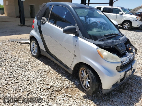 2009 Smart fortwo Pure with VIN WMEEJ31X49K224990, listed as a Copart auction lot 52111335 with 72,317 mi miles and Salvage Title. Bid and sale history available at carsss.com. Image 4.