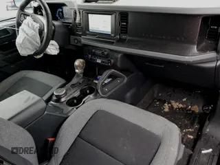 2023 Ford Bronco with VIN 1FMDE5AH6PLB56147, listed as a Copart auction lot 85275394 with 24,594 mi miles and Salvage title. Bid and sale history available at DreamBid. Image 8.