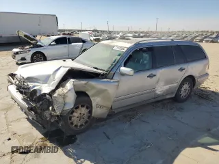 1999 Mercedes-Benz E-Class with VIN WDBJH65F7XA873728, listed as a Copart auction lot 71123304 with 0 mi miles and Salvage Title. Bid and sale history available at carsss.com. Image 1.