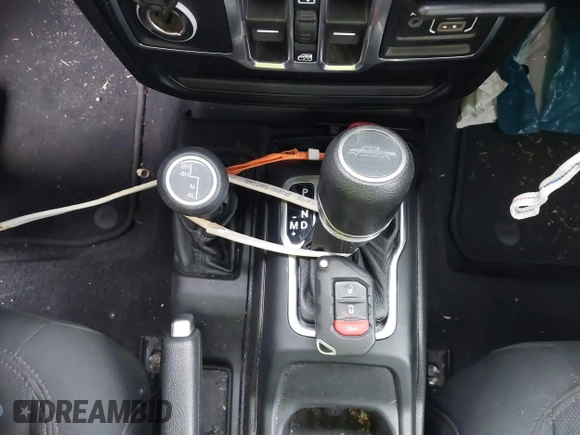 2020 Jeep Gladiator Sport S with VIN 1C6HJTAG9LL194454, listed as a IAAI auction lot 42430339 with 90,461 mi miles and . Bid and sale history available at DreamBid. Image 11.
