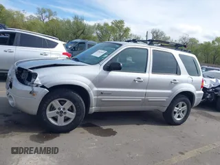 2006 Ford Escape Hybrid with VIN 1FMYU96H76KA14124, listed as a IAAI auction lot 42063449 with 53,055 mi miles and . Bid and sale history available at DreamBid. Image 14.