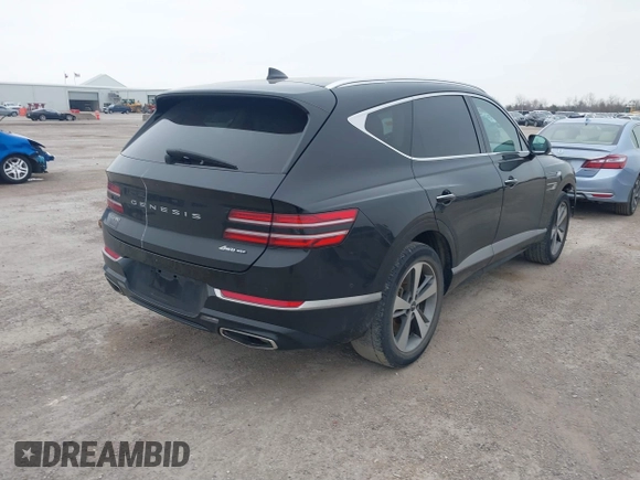 2021 Genesis GV80 with VIN KMUHCESC9MU063172, listed as a IAAI auction lot 41485442 with 69,590 mi miles and . Bid and sale history available at DreamBid. Image 4.