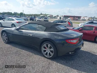 2013 Maserati GranTurismo Convertible Sport with VIN ZAM45MMA2D0069786, listed as a IAAI auction lot 40874830 with 37,312 mi miles. Bid and sale history available at carsss.com. Image 3.