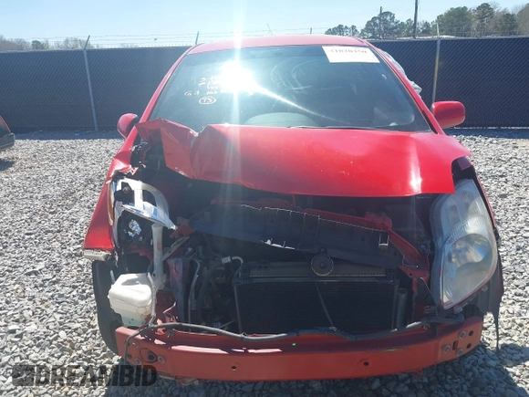 2011 Toyota Yaris with VIN JTDJT4K30B5332648, listed as a IAAI auction lot 41820350 with 216,482 mi miles. Bid and sale history available at carsss.com. Image 6.