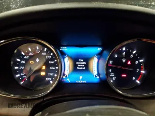 2017 Maserati Quattroporte z VIN ZAM56RRL4H1217395, wystawiony jako Copart lot #83762004 z przebiegiem 41 409 mil mil oraz Szkoda całkowita • Salvage title. Historia ofert i sprzedaży dostępna na DreamBid. Obrazek 9.
