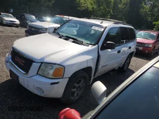 2005 GMC Envoy SLE with VIN 1GKDS13S352136539, listed as a Copart auction lot 64413405 with Not provided miles and Salvage title. Bid and sale history available at DreamBid. Image 1.