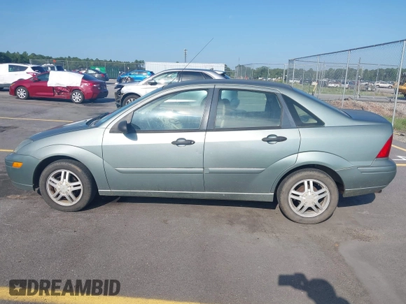 2003 Ford Focus SE with VIN 1FAFP34P13W304346, listed as a IAAI auction lot 42706827 with 239,800 mi miles and . Bid and sale history available at DreamBid. Image 14.