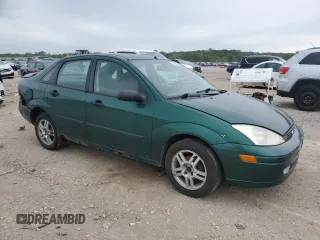 2000 Ford Focus SE z VIN 1FAFP3438YW379761, wystawiony jako Copart lot #58156125 z przebiegiem 103 816 mil mil oraz Szkoda całkowita • Salvage title. Historia ofert i sprzedaży dostępna na DreamBid. Obrazek 4.