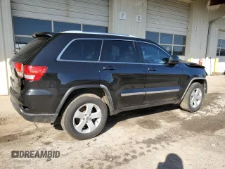 2012 Jeep Grand Cherokee Laredo with VIN 1C4RJEAG2CC215525, listed as a Copart auction lot 51876105 with 148,659 mi miles and Salvage Title. Bid and sale history available at carsss.com. Image 3.