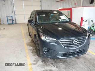 2016 Mazda CX-5 Grand Touring with VIN JM3KE2DY9G0705127, listed as a IAAI auction lot 41412910 with 181,993 mi miles. Bid and sale history available at carsss.com. Image 1.