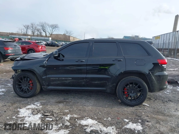 2017 Jeep Grand Cherokee SRT with VIN 1C4RJFDJ7HC641926, listed as a IAAI auction lot 41272215 with 117,667 mi miles. Bid and sale history available at carsss.com. Image 13.