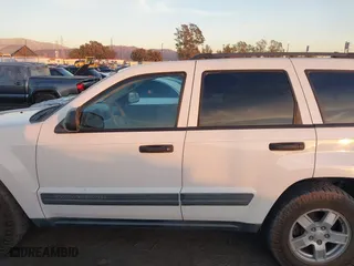 2006 Jeep Grand Cherokee Laredo with VIN 1J8GS48K16C348315, listed as a IAAI auction lot 41062772 with 239,662 mi miles. Bid and sale history available at carsss.com. Image 13.