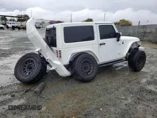 2013 Jeep Wrangler Sahara z VIN 1C4AJWBG7DL512437, wystawiony jako Copart lot #48928325 z przebiegiem Nie podano mil oraz Szkoda całkowita • Salvage title. Historia ofert i sprzedaży dostępna na DreamBid. Obrazek 3.