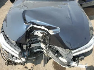 2017 BMW 7 Series 750i xDrive with VIN WBA7B0C57HG527064, listed as a Copart auction lot 62463405 with 103,454 mi miles and Salvage title. Bid and sale history available at DreamBid. Image 11.