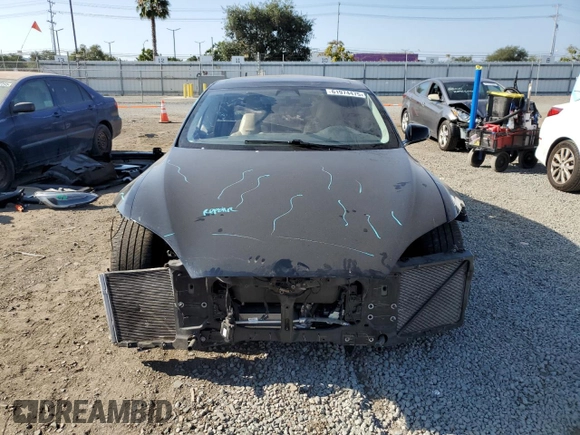2016 Tesla Model S 90D with VIN 5YJSA1E20GF169954, listed as a Copart auction lot 61974475 with 124,560 mi miles and Salvage title. Bid and sale history available at DreamBid. Image 5.