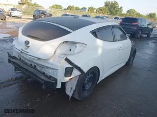 2017 Hyundai Veloster with VIN KMHTC6AD2HU312538, listed as a IAAI auction lot 42128452 with 1 mi miles. Bid and sale history available at carsss.com. Image 4.