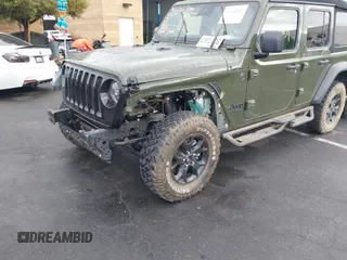 2023 Jeep Wrangler Unlimited Willys Sport with VIN 1C4HJXDM0PW515898, listed as a IAAI auction lot 41419267 with 10,964 mi miles and . Bid and sale history available at DreamBid. Image 6.