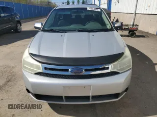 2009 Ford Focus SE z VIN 1FAHP35N29W126266, wystawiony jako Copart lot #56886465 z przebiegiem 420 672 mil mil oraz Czysty tytuł • Clean title. Historia ofert i sprzedaży dostępna na DreamBid. Obrazek 5.
