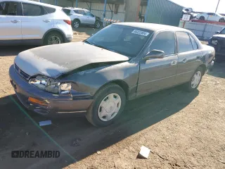 1996 Toyota Camry LE z VIN 4T1BF12K9TU863108, wystawiony jako Copart lot #86322004 z przebiegiem 342 459 mil mil oraz Szkoda całkowita • Salvage title. Historia ofert i sprzedaży dostępna na DreamBid. Obrazek 1.