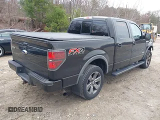 2013 Ford F-150 XL with VIN 1FTFW1ET0DFA97592, listed as a IAAI auction lot 42026885 with 165,091 mi miles. Bid and sale history available at carsss.com. Image 4.