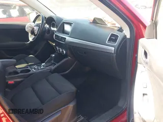 2016 Mazda CX-5 Touring with VIN JM3KE4CY0G0890309, listed as a IAAI auction lot 41890840 with 89,023 mi miles and . Bid and sale history available at carsss.com. Image 5.