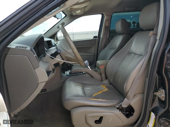 2007 Jeep Grand Cherokee Laredo with VIN 1J8HS48P37C594980, listed as a Copart auction lot 74819394 with 105,904 mi miles and Salvage Title. Bid and sale history available at carsss.com. Image 7.
