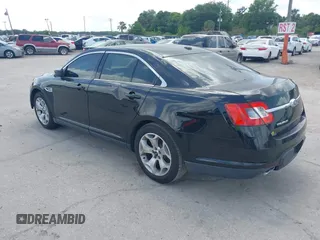 2012 Ford Taurus SEL with VIN 1FAHP2EW8CG113879, listed as a IAAI auction lot 42004495 with 194,952 mi miles and . Bid and sale history available at DreamBid. Image 3.