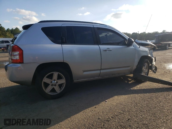 2010 Jeep Compass Sport with VIN 1J4NF4FB4AD513051, listed as a Copart auction lot 79667494 with 0 mi miles and Salvage Title. Bid and sale history available at carsss.com. Image 3.