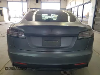 2022 Tesla Model S с VIN 5YJSA1E5XNF488415, выставлен на аукционе Copart как лот 57347565 с пробегом 18 662 миль миль и Списание • Salvage title. История ставок и продаж доступна на DreamBid. Изображение 6.