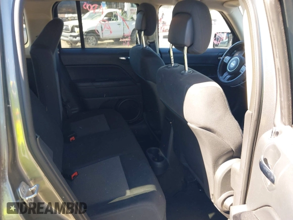 2013 Jeep Patriot Latitude with VIN 1C4NJPFB7DD254744, listed as a IAAI auction lot 40540820 with 129,465 mi miles and . Bid and sale history available at carsss.com. Image 8.