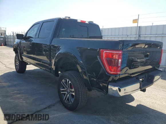 2021 Ford F-150 XL with VIN 1FTFW1E54MFD11453, listed as a Copart auction lot 50240015 with 8,645 mi miles and Salvage title. Bid and sale history available at DreamBid. Image 2.