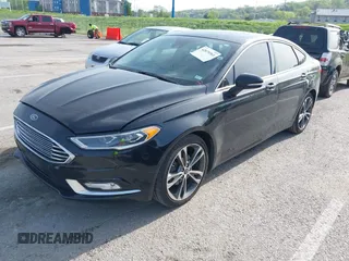 2017 Ford Fusion Titanium with VIN 3FA6P0K91HR257462, listed as a IAAI auction lot 42079361 with 124,914 mi miles and . Bid and sale history available at DreamBid. Image 2.