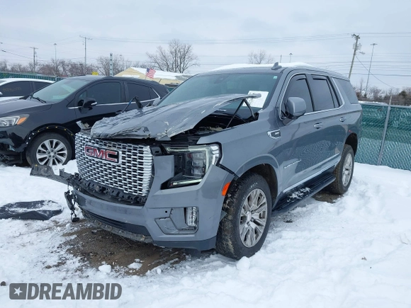 2021 GMC Yukon Denali with VIN 1GKS2DKL8MR216007, listed as a IAAI auction lot 41246785 with 83,058 mi miles. Bid and sale history available at carsss.com. Image 2.