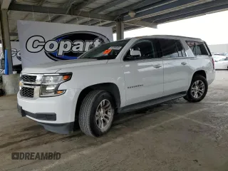 2019 Chevrolet Suburban LT z VIN 1GNSCHKC3KR409590, wystawiony jako Copart lot #54360495 z przebiegiem 118 373 mil mil oraz Szkoda całkowita • Salvage title. Historia ofert i sprzedaży dostępna na DreamBid. Obrazek 1.