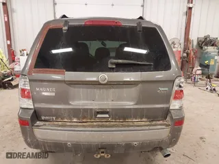 2010 Mercury Mariner Premier with VIN 4M2CN9HGXAKJ11983, listed as a IAAI auction lot 41512060 with 154,971 mi miles. Bid and sale history available at carsss.com. Image 16.