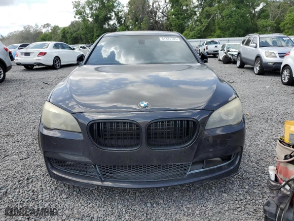2012 BMW 7 Series 750i xDrive with VIN WBAKC6C5XCC397243, listed as a Copart auction lot 51331165 with 77,424 mi miles and Clean Title. Bid and sale history available at carsss.com. Image 5.