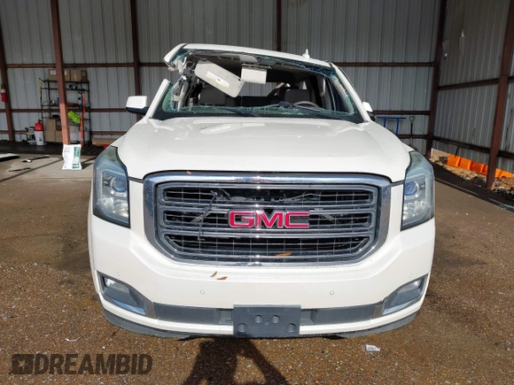 2015 GMC Yukon SLT with VIN 1GKS2BKC6FR612606, listed as a IAAI auction lot 41096580 with Not Provided miles and . Bid and sale history available at DreamBid. Image 13.