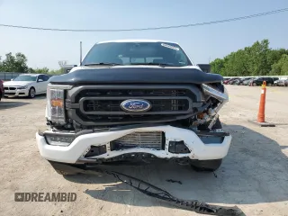 2023 Ford F-150 XL with VIN 1FTFW1E81PFA70563, listed as a Copart auction lot 60440685 with 31,198 mi miles and Salvage title. Bid and sale history available at DreamBid. Image 5.