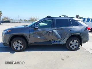 2024 Toyota RAV4 Hybrid LE with VIN JTMMWRFV0RD248035, listed as a IAAI auction lot 42339244 with 18,317 mi miles and . Bid and sale history available at DreamBid. Image 6.